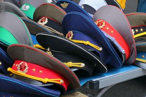 Sale stand of Soviet and DDR militaria near Checkpoint Charlie in Berlin, Germany.