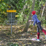 junge Discgolferin