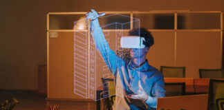 Ein Architekt trägt eine Virtual-Reality-Brille. Foto: IMAGO / Westend61