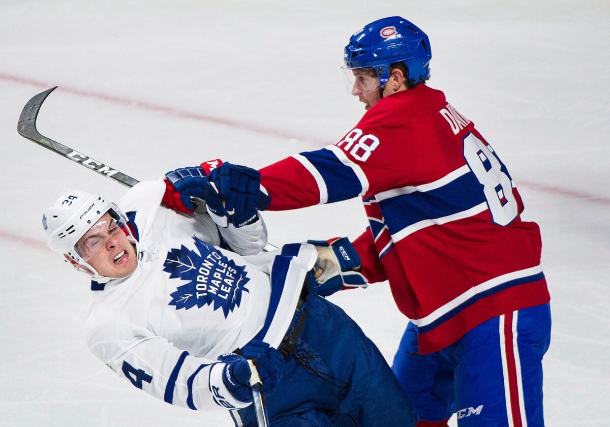 Brandon Davidson (r) im Trikot der Montréal Canadiens Der neue Eisbär Brandon Davidson (r) kann gut zupacken. (Archivbild)